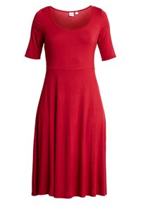 Punainen, lyhythihainen mekko, jossa on pyöreä pääntie. Valmistettu sileästä kankaasta, siinä on kellotettu hamekuva, jossa on keskipitkä helma.