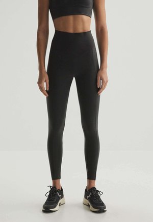 COMPRESSIVE - Leggings - Trousers - black