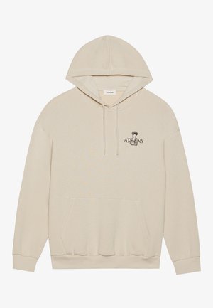 Beige hoodie met een voorzak, capuchon met trekkoord en een geprint "ATHENEN" ontwerp op de linker borst. Soepele textuur en losse pasvorm.