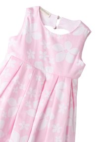 Rotes Baumwollkleid mit floralen Muster in Weiß, ärmelloses Design, plissierter Rock und ein rückseitiger Schlitz mit Druckknopfverschluss.