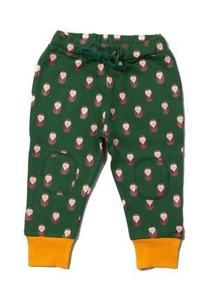 Green cotton sweatpants with owl pattern, featuring yellow cuffs, side pockets, and a drawstring waist. Soft texture and elastic fit.