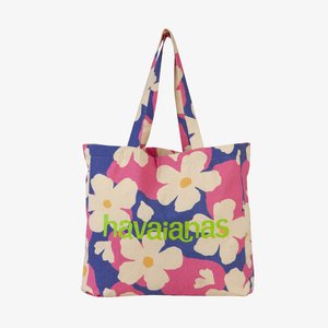 Plátená taška s kvetinovým vzorom v ružovej, bielej a modrej farbe; slovo "havaianas" vytlačené jasne zelenou farbou. Dvojité ramenné popruhy.