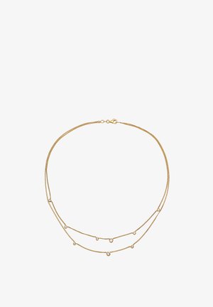 Halskæde i gylden tone med flere lag og dobbelte kæder med små runde krystaller, delikat design med glat tekstur.