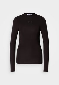 Black long-sleeve top made of stretchy fabric with a crew neckline and minimalistic logo detail on the chest. Smooth texture, fitted design.