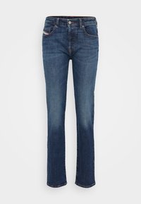Mörkblå denimjeans med rak bendesign, med en knapp- och dragkedjeslutning, fem fickor och subtila sömnadsdetaljer.