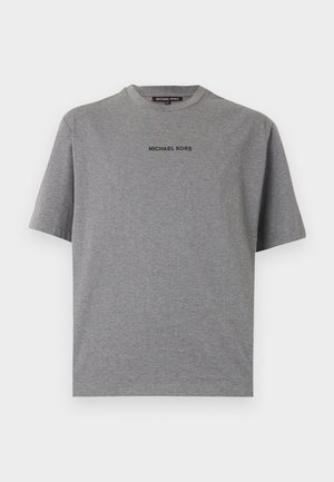 Hall lühikeste varrukatega ümara kaelusega T-särk, millel on musta värviga rinnal tekst „MICHAEL KORS“, esitletud valgel taustal.