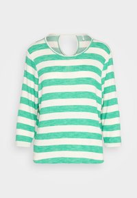Camicia a maniche lunghe a righe verdi e bianche, con colletto rotondo e un'apertura sul retro. Realizzata in un tessuto leggero.