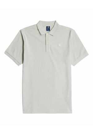 Light gray polo shirt made of a smooth fabric, featuring a three-button placket, a soft collar, and a small logo on the chest.