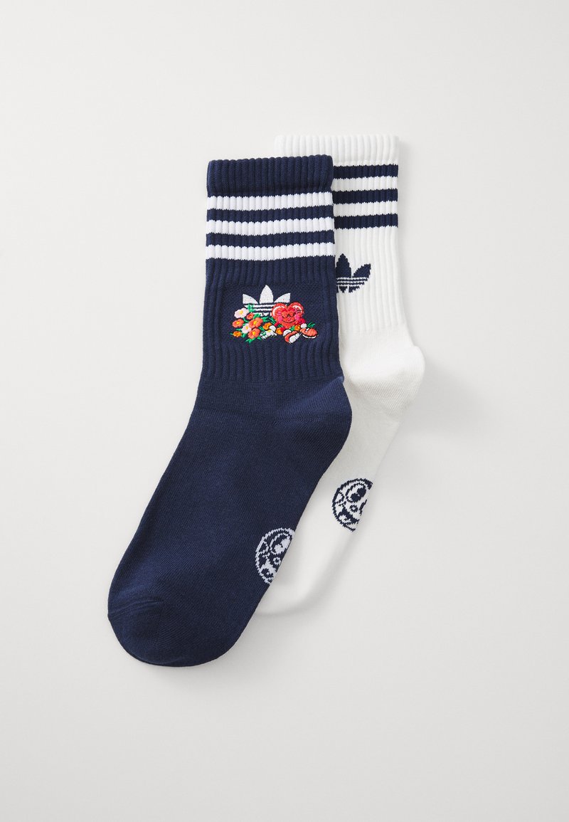 Navy and white striped socks featuring floral embroidery on the navy side and circular logo detail on the white side. Cotton blend material.