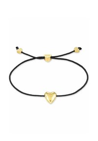 Bracciale in corda nera con un charm a forma di cuore dorato lucido al centro, accentuato da due piccole perline a forma di cuore dorato. Design semplice, lunghezza regolabile.