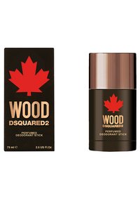 Déodorant parfumé sous forme de stick dans un tube marron avec un capuchon métallique. L'emballage présente une boîte noire avec une feuille d'érable rouge et un texte doré.
