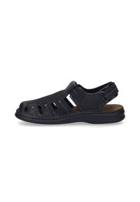 Black leather sandal with open design, featuring cut-outs, stitching accents, and a cushioned insole. Back strap for secure fit. Lightweight sole.