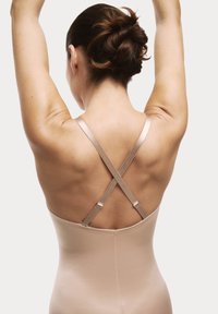 Naakt dans-bodysuit met gekruiste dunne bandjes, die een gladde, aansluitende uitstraling toont die de rug accentueert.