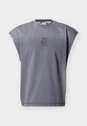 Grey sleeveless crewneck shirt with black double "H" and Nike swoosh logo centered on the chest, set against a plain light background.
