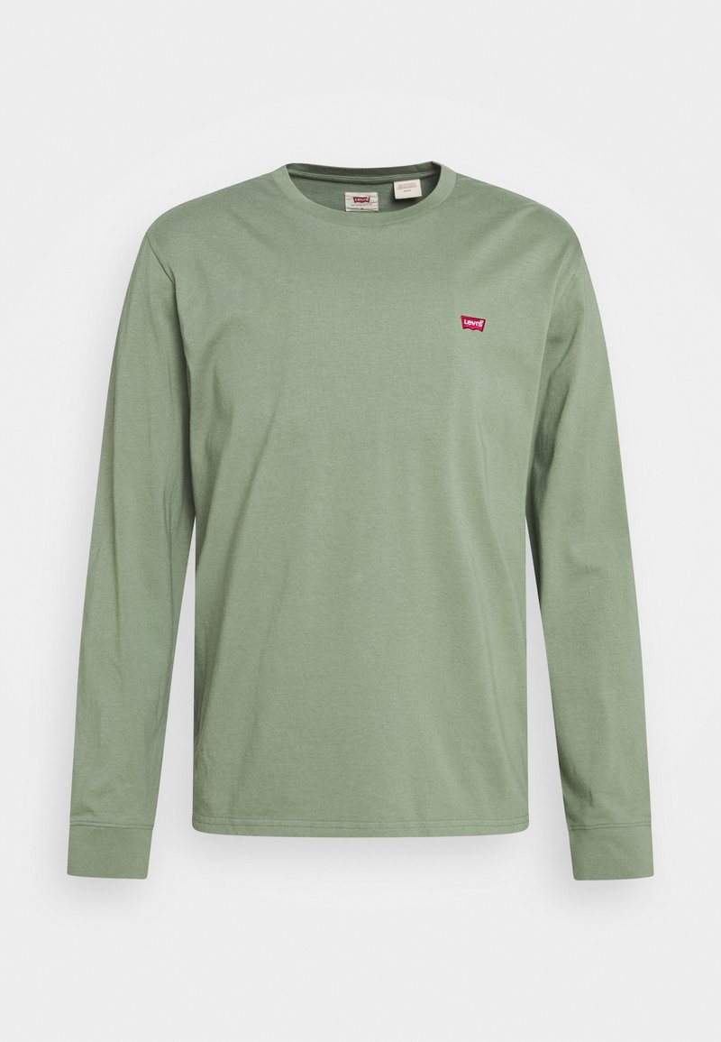 Langärmliges T-Shirt aus weichem, hellgrünem Baumwollstoff mit rundem Halsausschnitt. Mit kleinem roten Levi's-Logo auf der Brust.