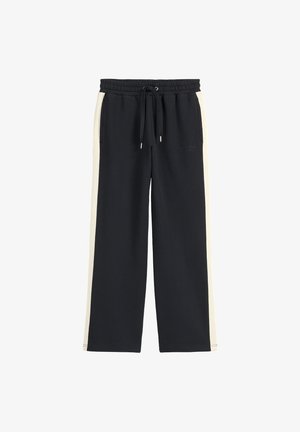 Zwarte wijde sweatpants met elastische tailleband, trekkoord, zijzakken en witte zijstreep.