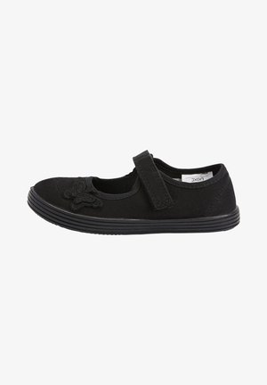 Chaussure Mary Jane noire avec bride velcro, semelle en caoutchouc et broderie papillon à l'avant, conçue pour un usage décontracté.