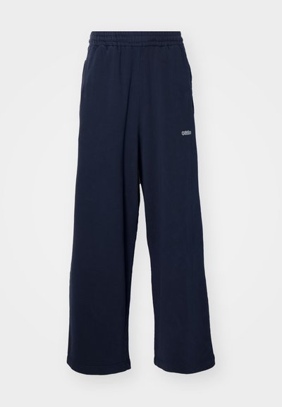 032c RÓZSA VICTORIA STRAIGHT CUT UNISEX - Tracksuit bottoms - dark blue
