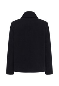 Manteau court en laine noire avec un large col, des manches longues et un dos épuré sans ornements ni coutures visibles.
