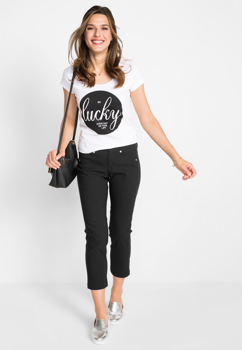 bonprix Pantaloni schwarz/nero