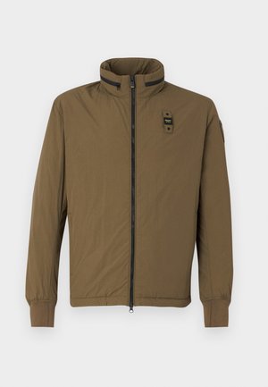 Brown lightweight jacket featuring a high collar, front zipper, and elastic cuffs. Includes a small logo on the chest and side pocket.