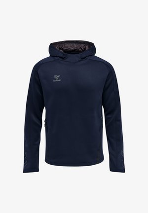 Marineblå hættetrøje med lange ærmer, foran lynlåse i siderne, subtile reflekterende Chevron-mønstre på ærmerne og lille hummel-logo på brystet.