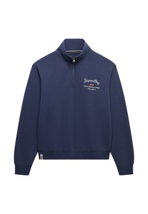 Sweat-shirt bleu marine à demi-fermeture éclair avec col montant, manches longues et logo "SuperDry" brodé en blanc sur la poitrine gauche.