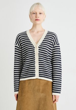 Navy and cream striped cardigan with a V-neck, button front, and long sleeves; textured knit fabric with contrasting ribbed trim.