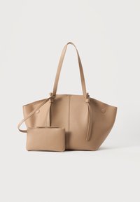 Sélectionné, taupe