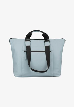 Sac fourre-tout bleu clair avec poignées noires, poche zippée à l'avant, forme rectangulaire, et matériau lisse et structuré sur fond blanc.