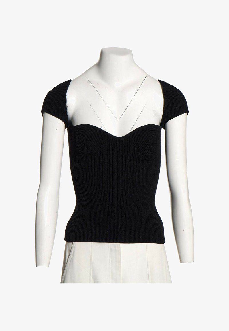 Haut noir à manches courtes en maille côtelée avec encolure en cœur, présenté sur un mannequin buste blanc sur fond blanc.