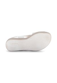Schoenen met een gestructureerde beige rubberen zool, een gladde witte bovenkant en een minimalistisch ontwerp. Merkl logo in de zool gedrukt.