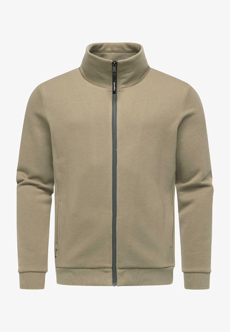 Felpa zip-up beige chiaro con colletto alto, maniche lunghe e polsini a coste. Realizzata in tessuto morbido, presenta una chiusura frontale con zip e tasche laterali.