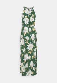 Robe maxi verte sans manches avec imprimé floral blanc et jaune, col halter et taille froncée.