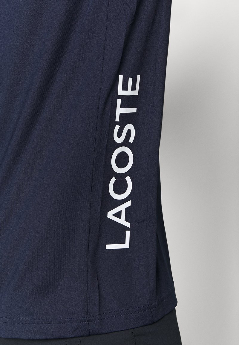 Lacoste BASIC GOLF - Camiseta deportiva - navy blue/azul Zalando.es