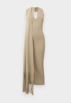 Sleeveless beige maxi dress with a keyhole neckline and attached long scarf featuring fringe detailing on one side.