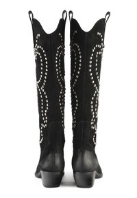 Black suede cowboy boots with a pointed toe, embellished with silver studs in a swirling pattern and finished with a stacked heel.