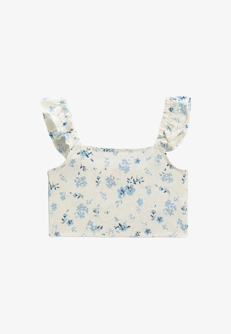Blomster crop top i cremefarvet, med blå blomsterprint, flæser på skulderstropperne og lige kant. Fremstillet af letvægtsstof.