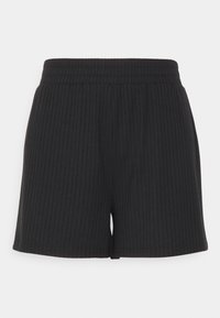 Svarta ribbade shorts med elastisk midja och avslappnad passform. Texturen är mjuk, med vertikala ribbade detaljer överallt.