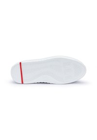 White rubber sneaker sole with textured ridges for traction and a red accent stripe on the heel. Flat, curved shape with a smooth finish.