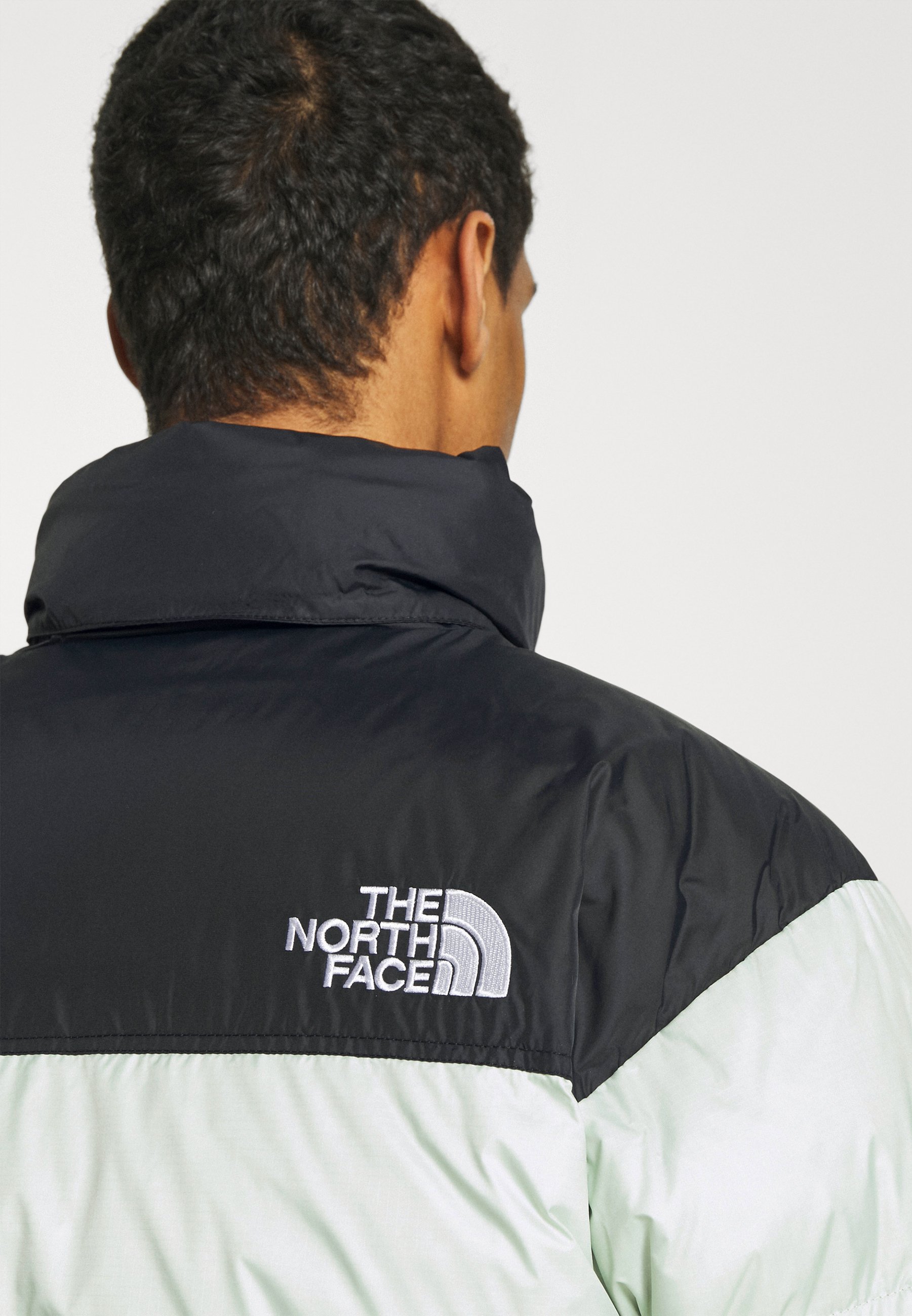 the north face 1996 retro nuptse jacket green mist