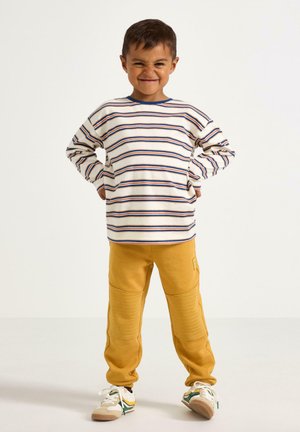 Lindex, LINDEX JOGGERS - Pantalon de survêtement - dusty yellow