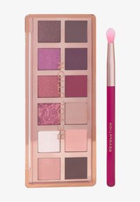 Eyeshadow palette featuring 9 shades in purples, pinks, and neutrals, with a shimmery finish. Includes a pink-tipped applicator brush.