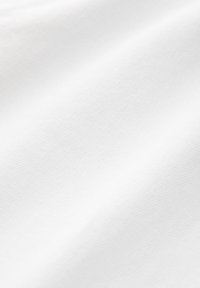 Cotton fabric in white, featuring a smooth texture and subtle diagonal ribbing pattern, with soft, even surface and no visible embellishments.