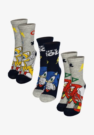 Tre paia di calzini con i personaggi dei cartoni animati Tails, Sonic e Knuckles della serie Sonic the Hedgehog con disegni colorati.