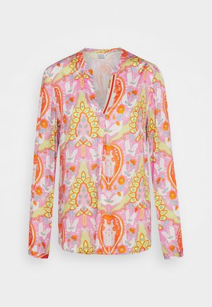 Blouse à manches longues avec un motif floral vibrant en rose, jaune et orange. Dotée d'un col en V avec une patte partielle et d'une coupe décontractée.