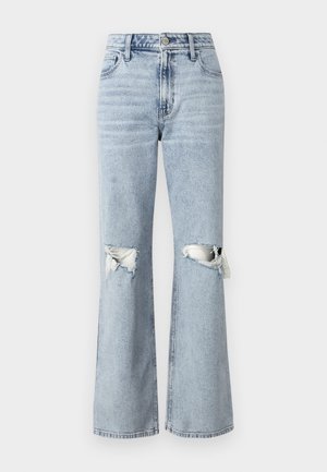 Lysevasket denimbukser med høyt liv og utsvingte ben. Har to slitte knesprag og standard fem-lomme-design.
