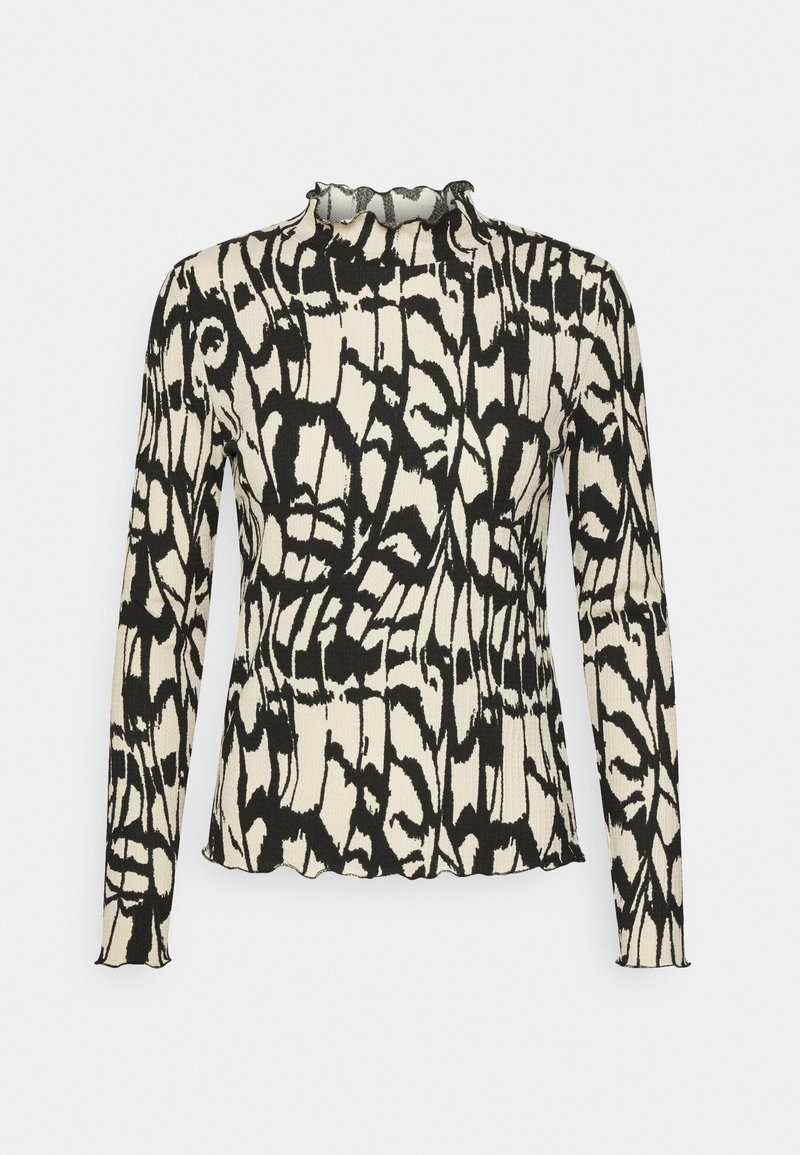 T-shirt noir et blanc à manches longues avec une texture côtelée, présentant un motif en vagues et un col festonné.