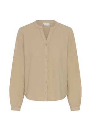 Bézs színű, hosszú ujjú blúz kerek nyakkivágással, gombos elejű és rugalmas mandzsettákkal.