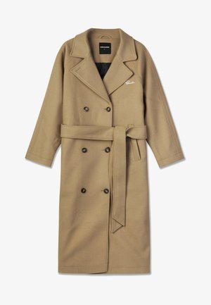 Beige double-breasted coat made of a soft fabric, featuring a tied belt, lapel collar, and two buttons. Includes a logo detail.